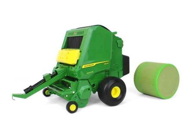 Presse à balles rondes JOHN DEERE 561R avec balle