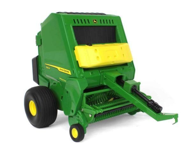 Presse à balles rondes JOHN DEERE 561R avec balle