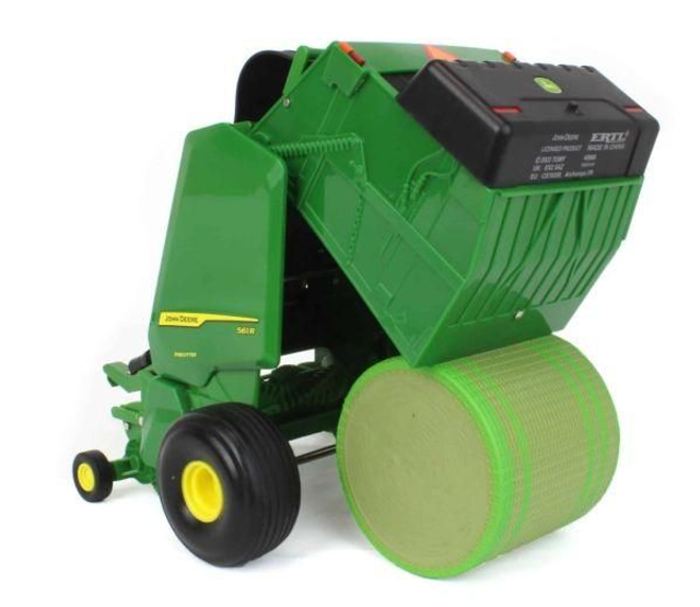 Presse à balles rondes JOHN DEERE 561R avec balle